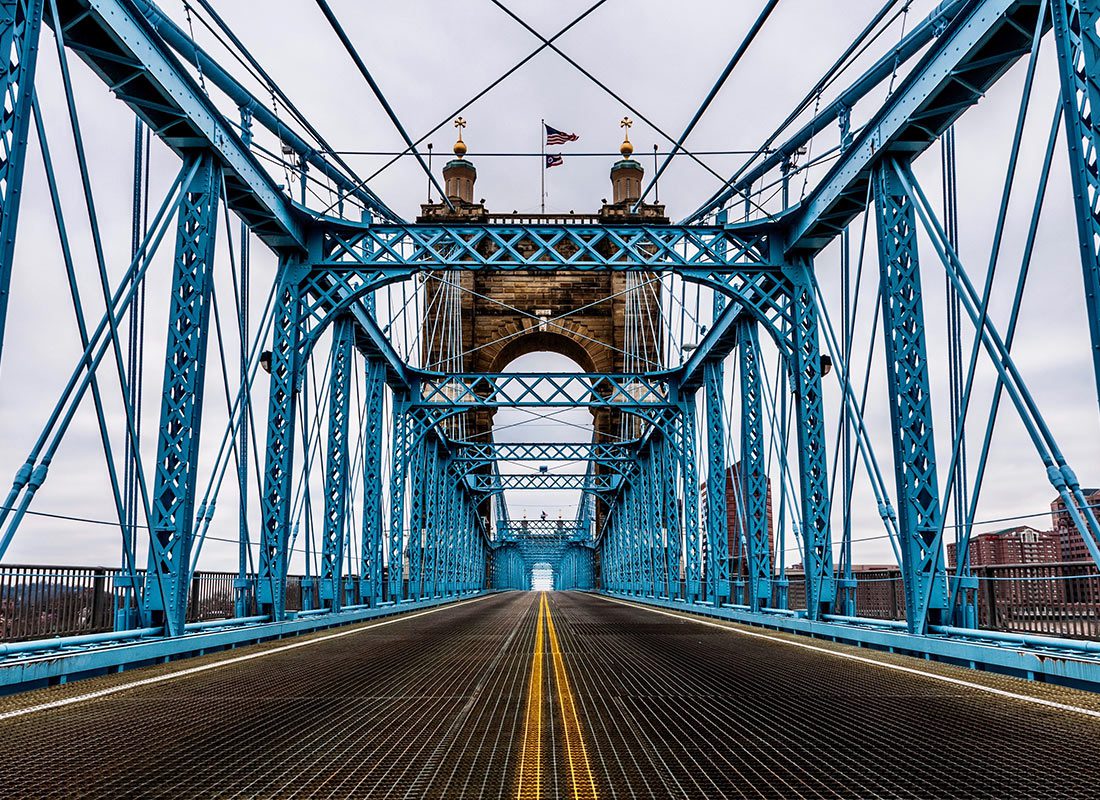 Cincinnati, OH Insurance - Looking Down the Blue John A. Roebling Suspension Bridge in Cincinnati, Ohio