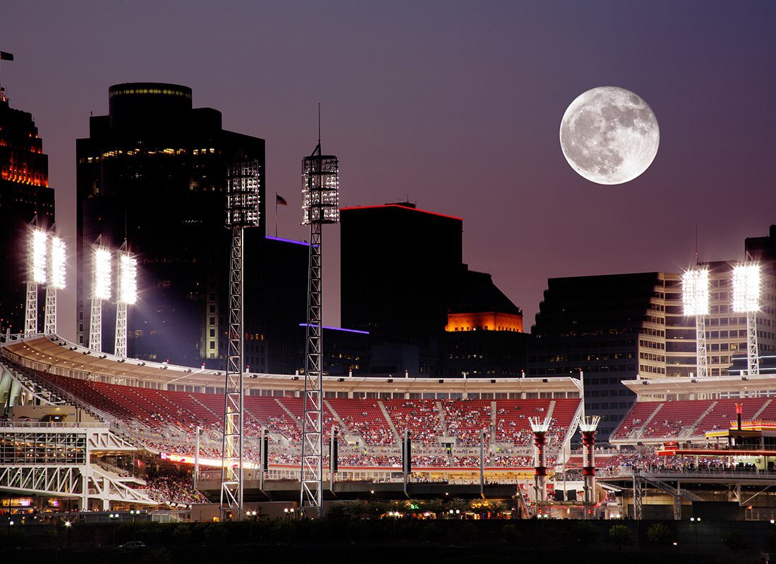 Contact - Cincinnati Stadium Lit up at Night, Skyline in the Background, Bright Full Moon Overhead